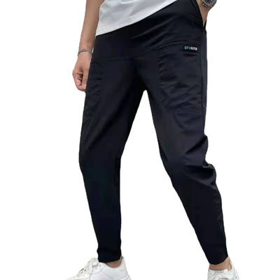Vlakke voorste stijl Mensen Cargo broek Instock met aangepaste knoppen losse fitness joggers