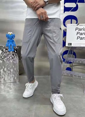 Vlakke voorste stijl Mensen Cargo broek Instock met aangepaste knoppen losse fitness joggers